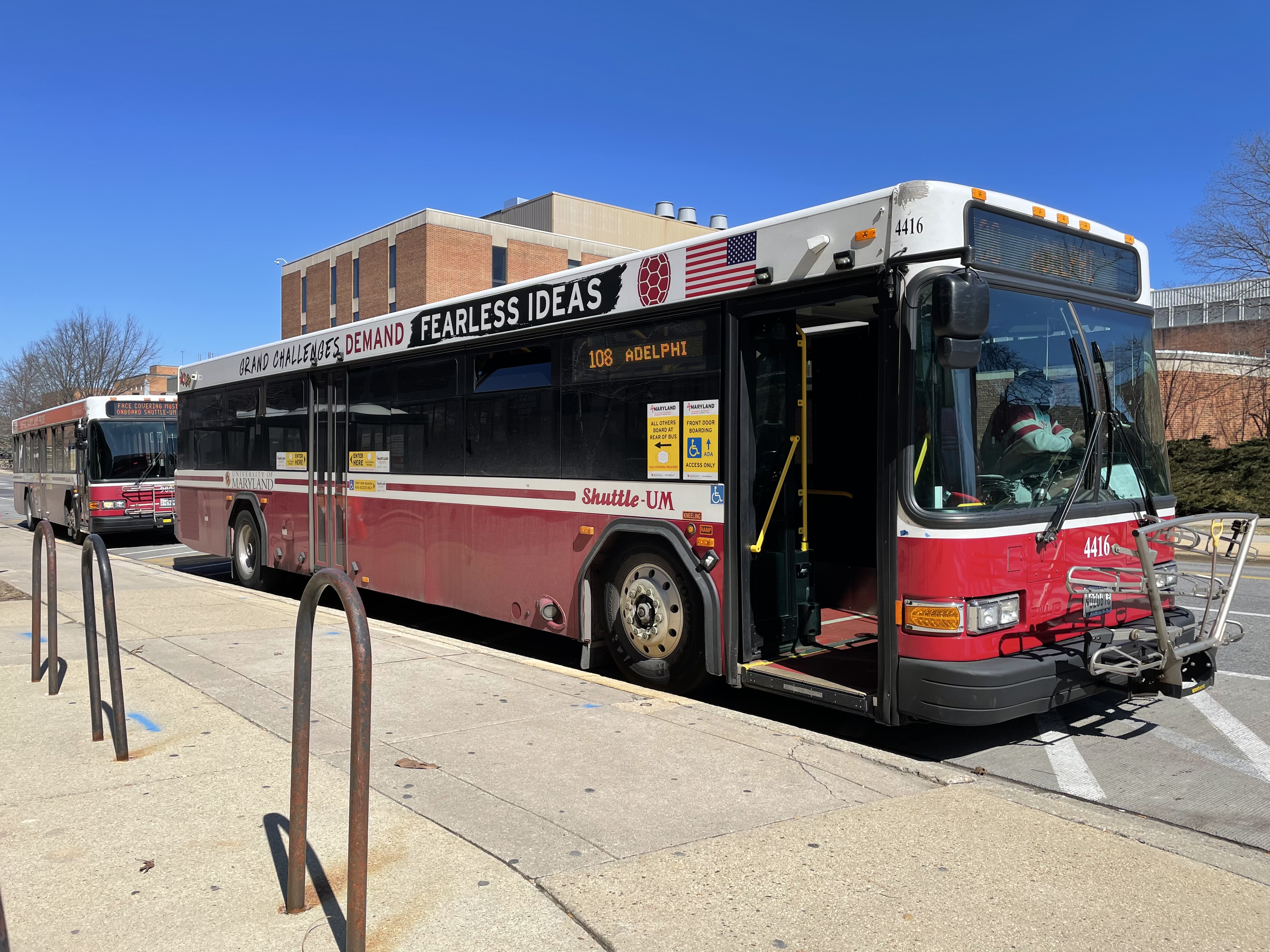 Shuttle bus 108 adelphi in front of regents