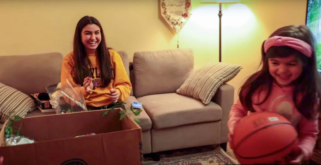 Sahar Afnan '24, a psychology and biological sciences major, visits a local refugee family as part of Peer to Peer's tutoring program. Since 2017, the organization has taught more than 300 students in Prince George's and Montgomery counties.